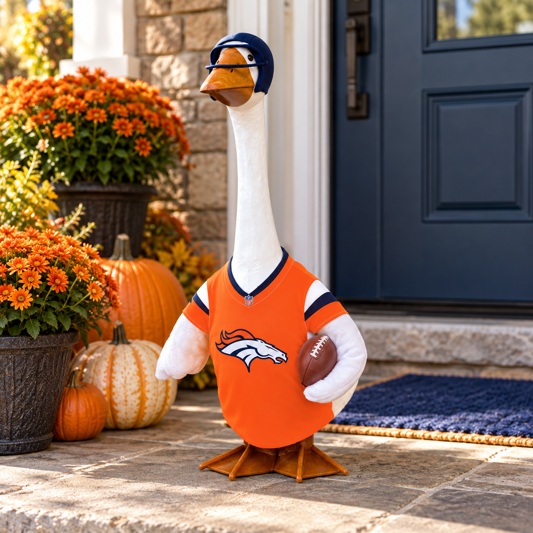 Porch goose modeling Denver Broncos outfit in a living room during a football game