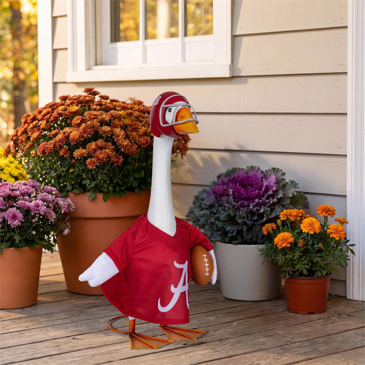 Alabama Crimson Tide football goose outfit displayed on a porch with flowers; decorative goose not included