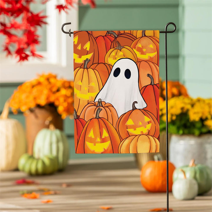 Pumpkin Patch Ghost Halloween flag displayed by a porch with autumn flowers and pumpkins