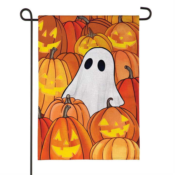 Halloween Pumpkin Patch Ghost flag displayed on a teal door with a flag holder