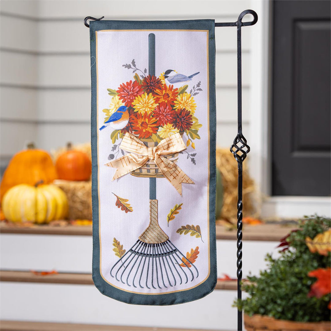 Fall Garden Rake and Mums 2 Sided Long Garden Flag hanging on stand with pumpkins and hay bales