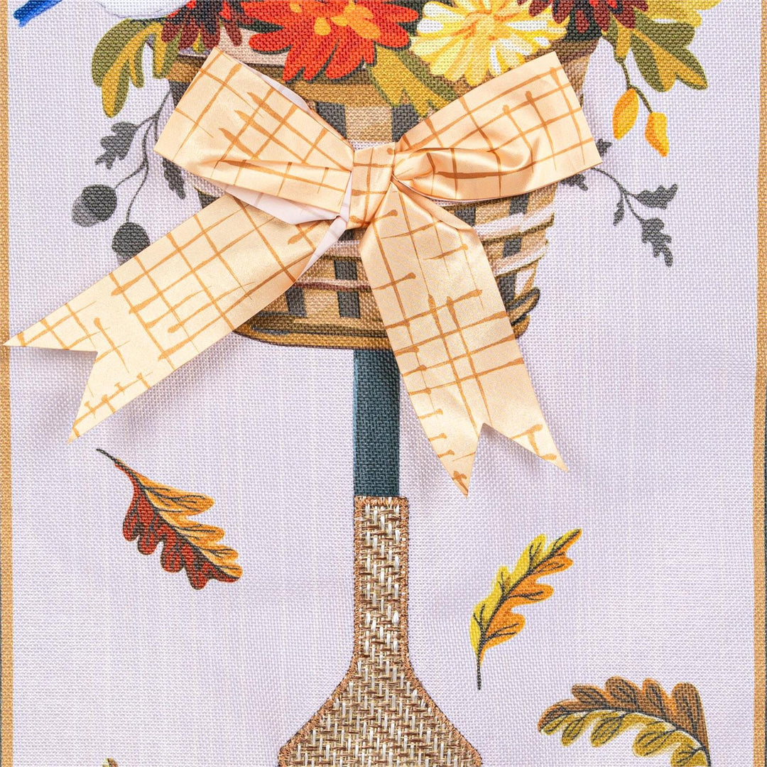 Fall Garden Rake and Mums Garden Flag close up of mums basket and plaid ribbon bow