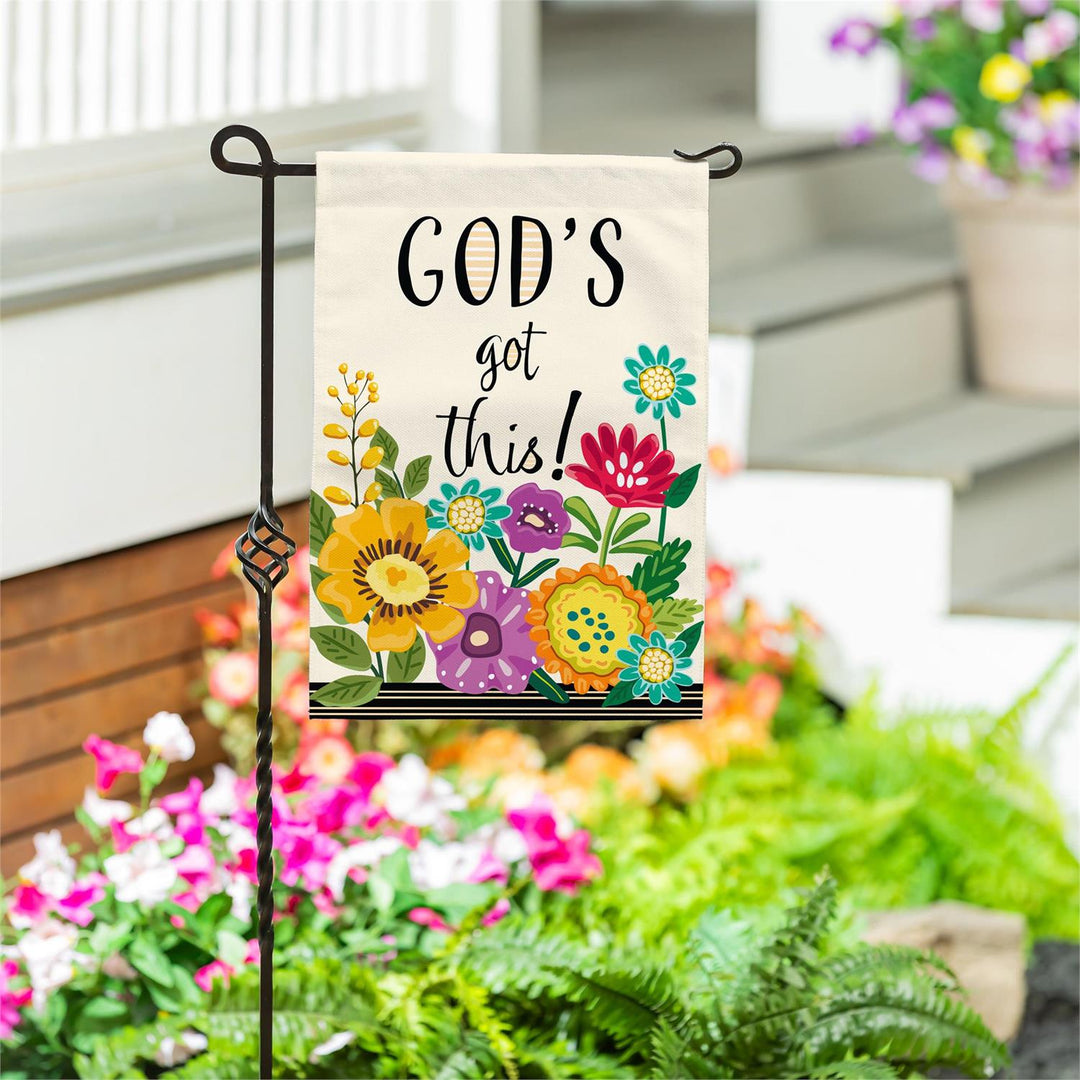 God's Got This cream burlap garden flag with colorful flowers and a black striped lower border