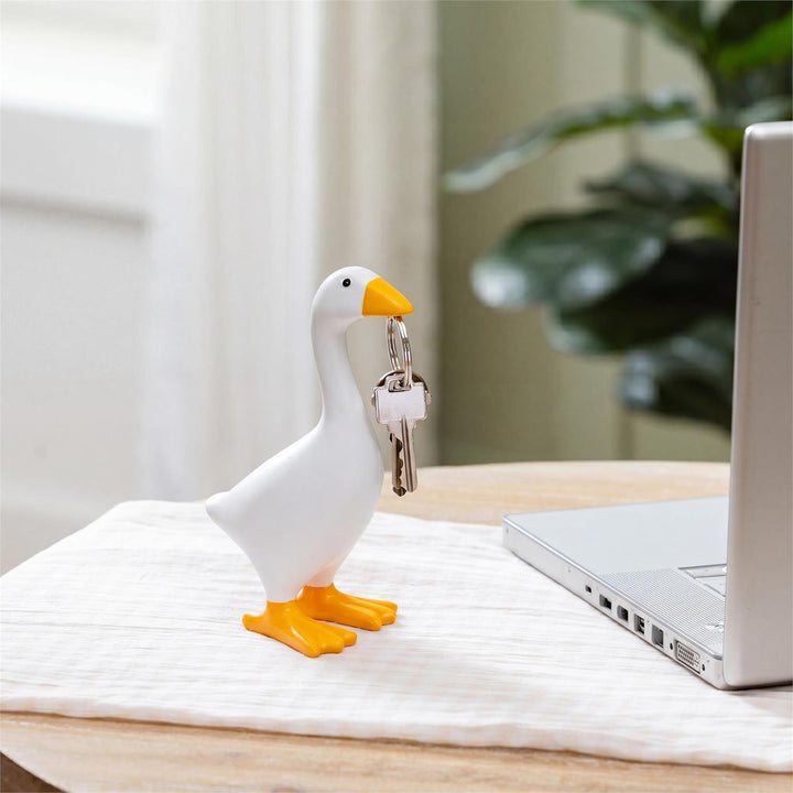 Gordy the Desktop Goose resin figurine with white body, orange beak and orange webbed feet