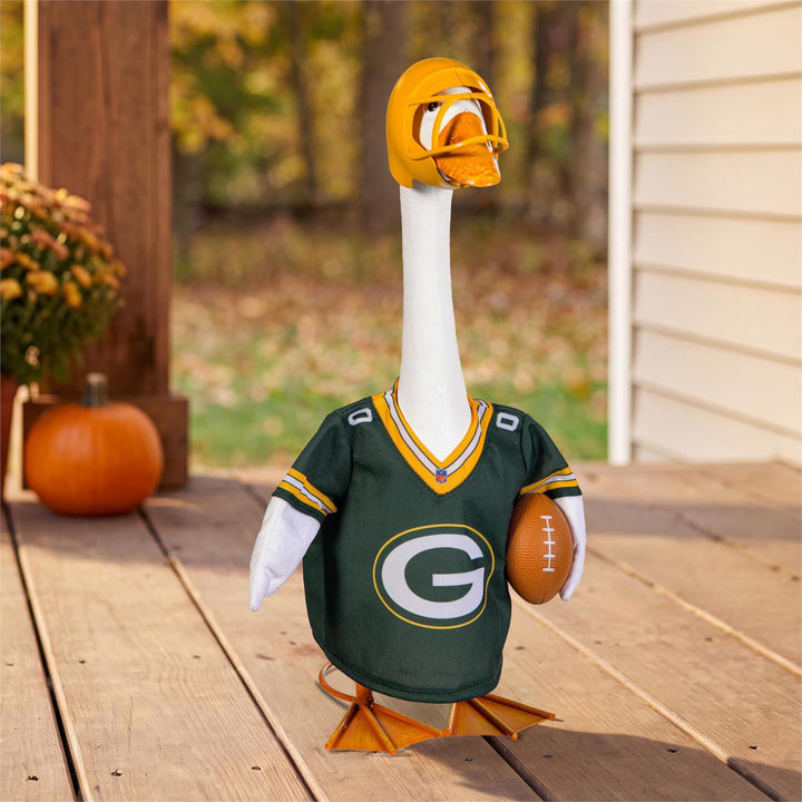 Licensed Green Bay Packers porch goose outfit worn by a 21-inch goose with green jersey and yellow helmet