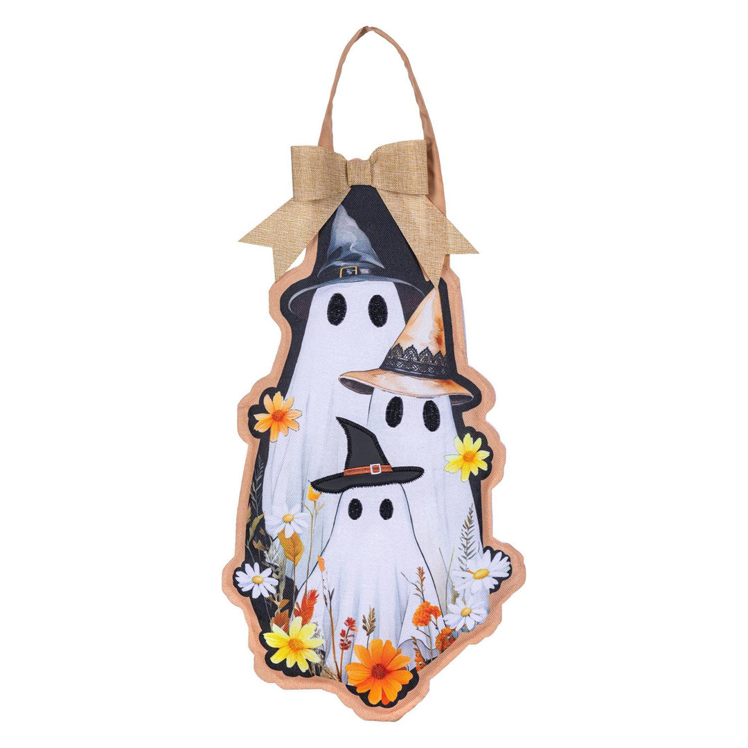 Halloween Ghost Family fabric door hanger displayed on a dark front door beside autumn pumpkins