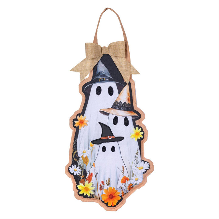 Halloween Ghost Family fabric door hanger displayed on a dark front door beside autumn pumpkins