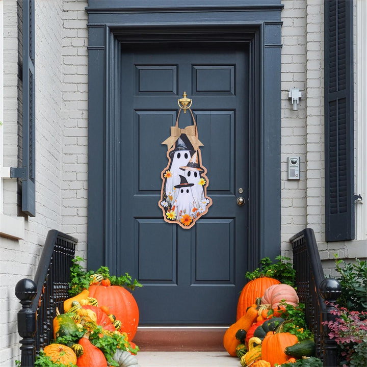 Halloween Ghost Family shaped door decor with three witch-hat ghosts, autumn flowers and a tan bow