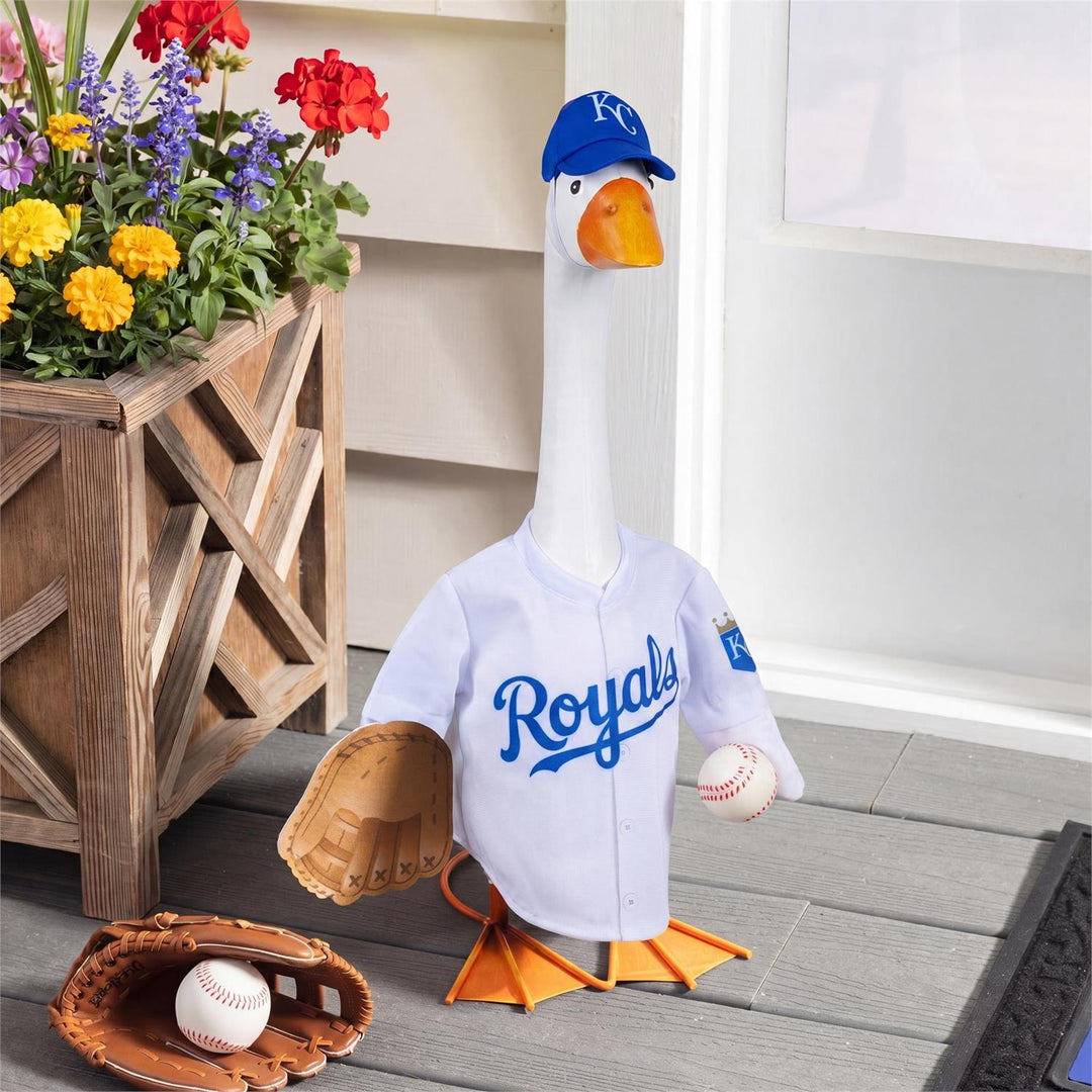 Rear view of porch goose modeling Royals jersey with outlined blue 01 and striped sleeves