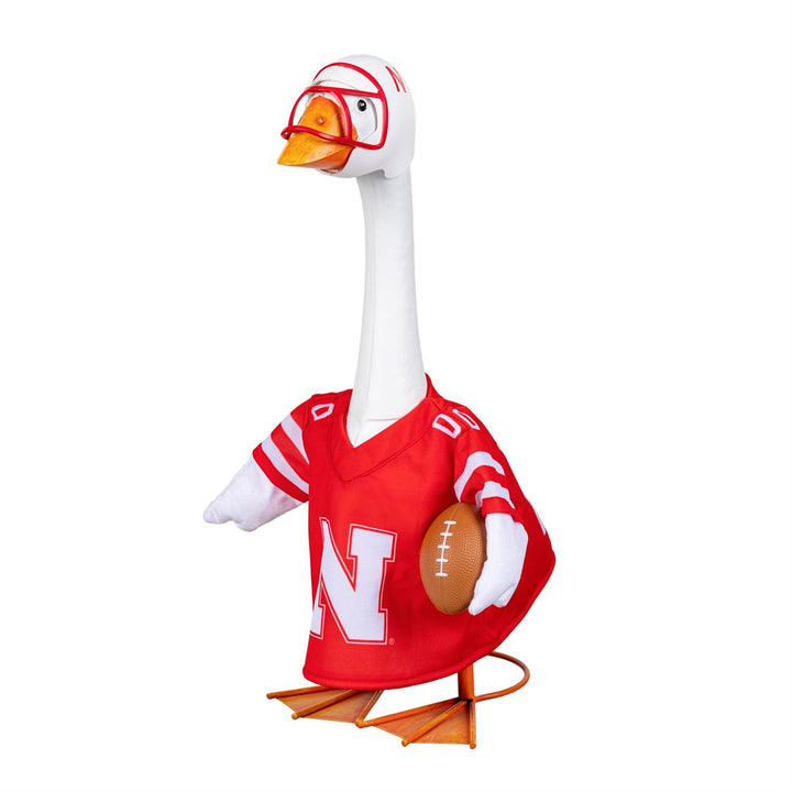 Front angled view of Nebraska porch goose football outfit with red jersey, white helmet, and football detail
