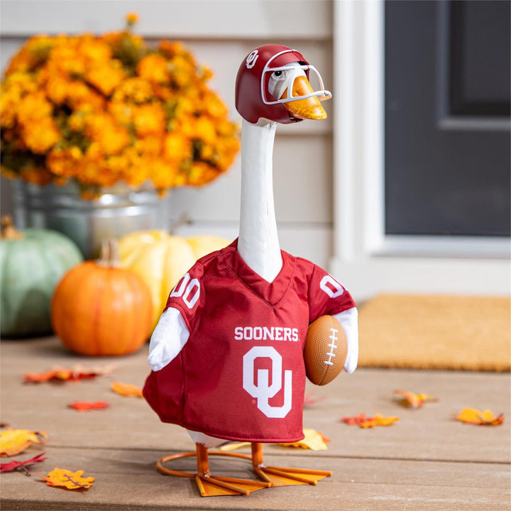 Oklahoma Sooners football goose outfit with crimson OU jersey, football accent and matching decorative helmet