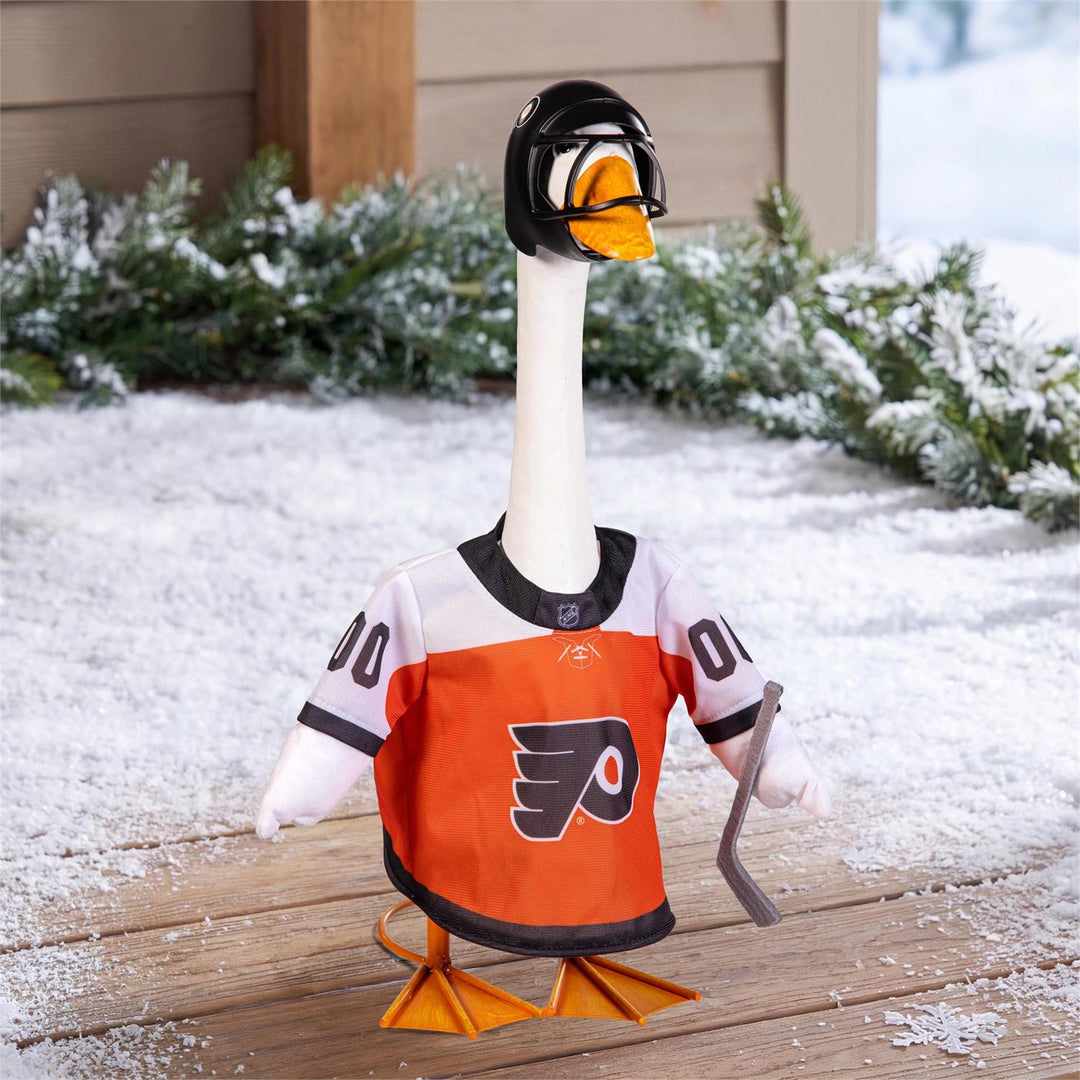 Rear of Philadelphia Flyers goose jersey outfit with PHILADELPHIA FLYERS 00 design, black helmet, and gray hockey stick