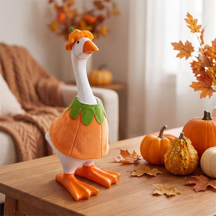 Pumpkin table goose outfit displayed with autumn pumpkins and leaves; goose and props not included