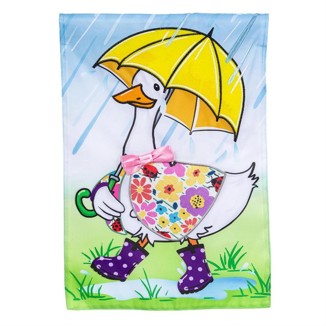 Rina The Rainy Day Goose Garden Flag - product flat lay showing goose with yellow umbrella, purple polka-dot rain boots, and floral apron