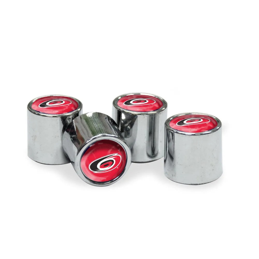 Four Carolina Hurricanes tire valve stem caps with polished silver-tone bodies and red hurricane-logo tops