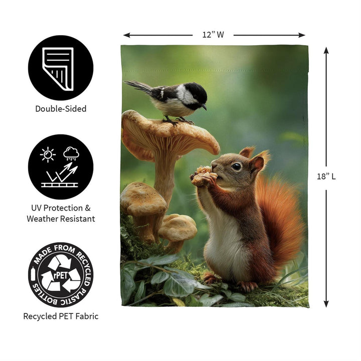 Woodland squirrel and chickadee garden flag displayed beside a porch and flower bed