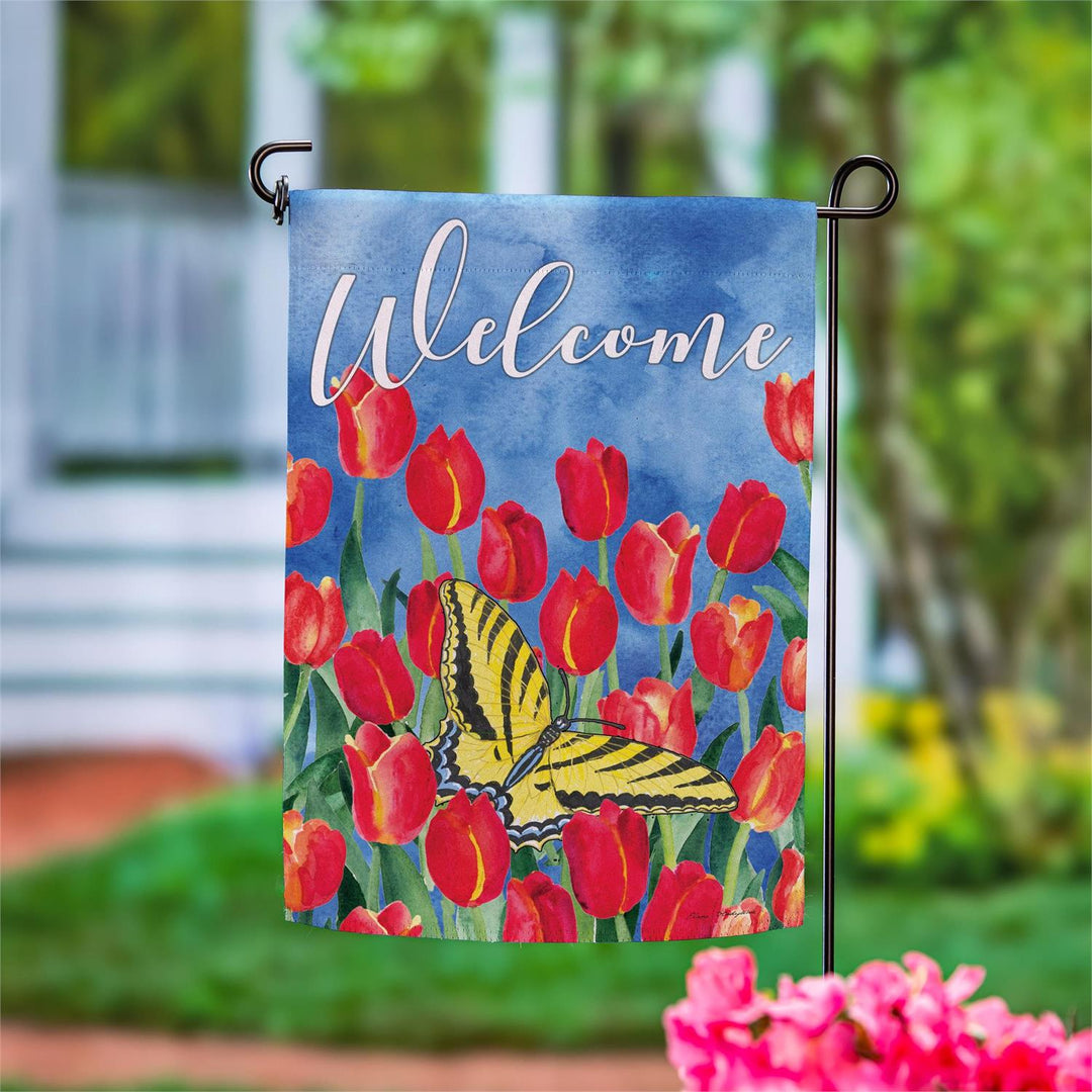 Tulips and butterfly Welcome garden flag with red flowers, yellow-and-black butterfly, and blue background