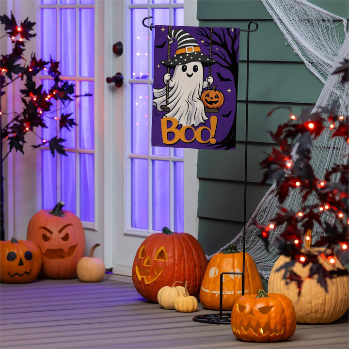 Swinging Ghost Halloween garden flag with purple background, smiling ghost, pumpkin and orange Boo lettering