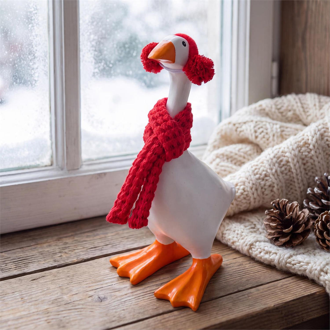 Red textured scarf and matching red pom-pom earmuffs for Gordy, goose not included