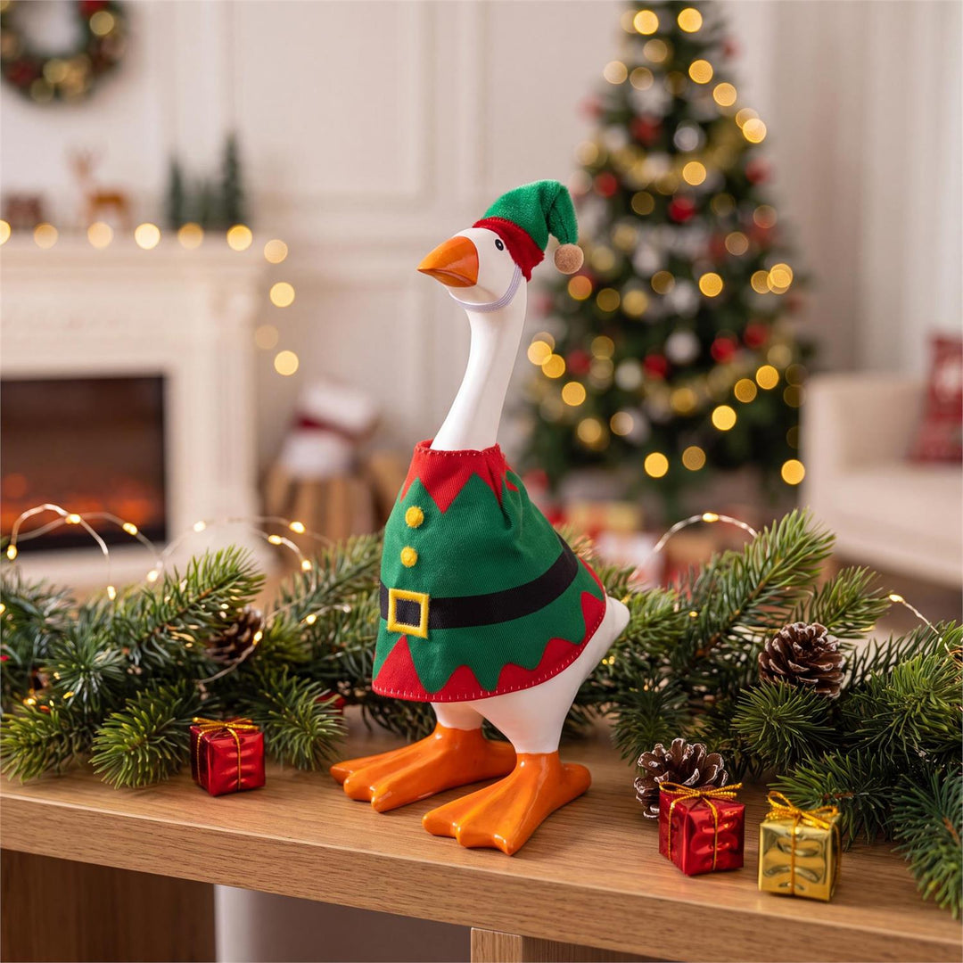 Gordy 8-inch table goose modeling a green and red Christmas elf outfit with matching pointed hat