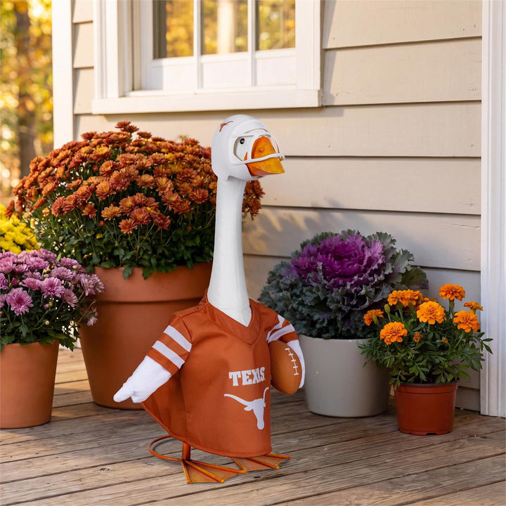 Texas Longhorns football outfit on a decorative porch goose with burnt-orange jersey and white helmet; goose not included