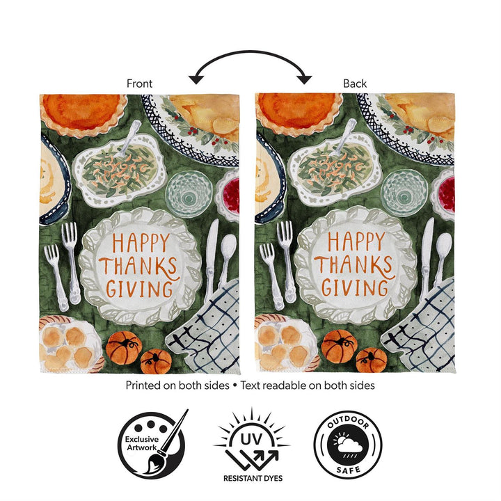 Happy Thanksgiving two-sided garden flag displayed beside autumn flowers and pumpkins