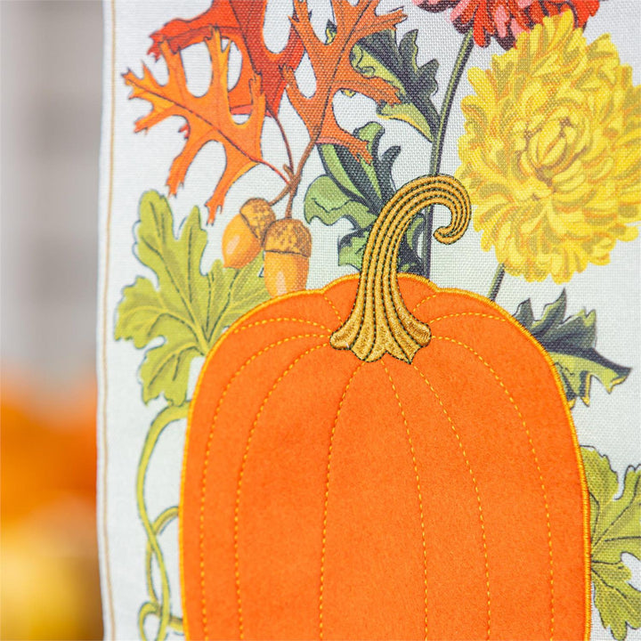 Vintage Welcome Autumn Garden Flag close up of embroidered pumpkin stem and mums