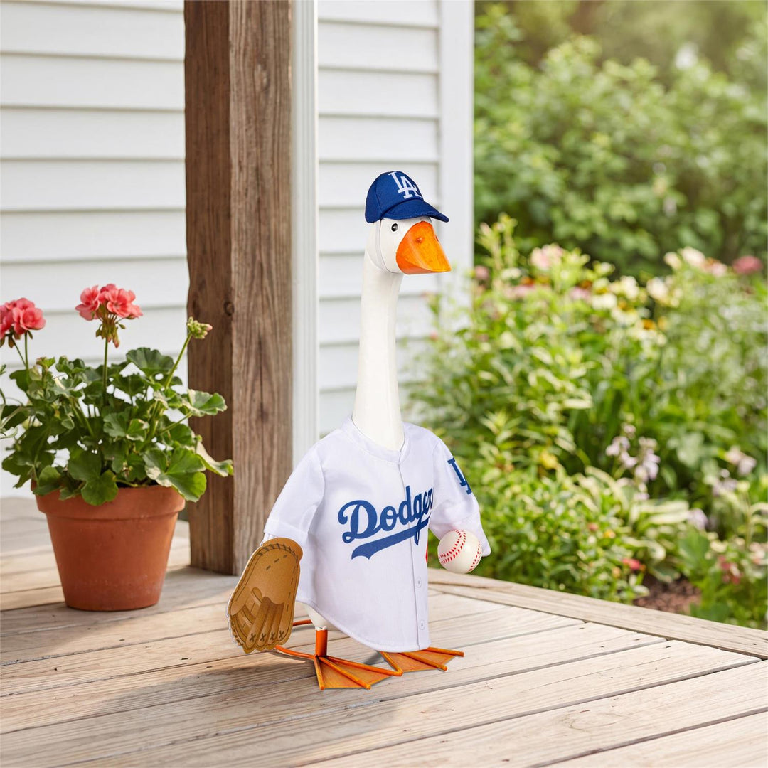21-inch porch goose wearing Los Angeles Dodgers outfit on a porch beside flowers