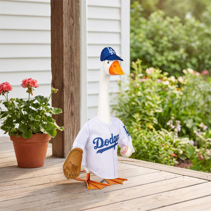21-inch porch goose wearing Los Angeles Dodgers outfit on a porch beside flowers