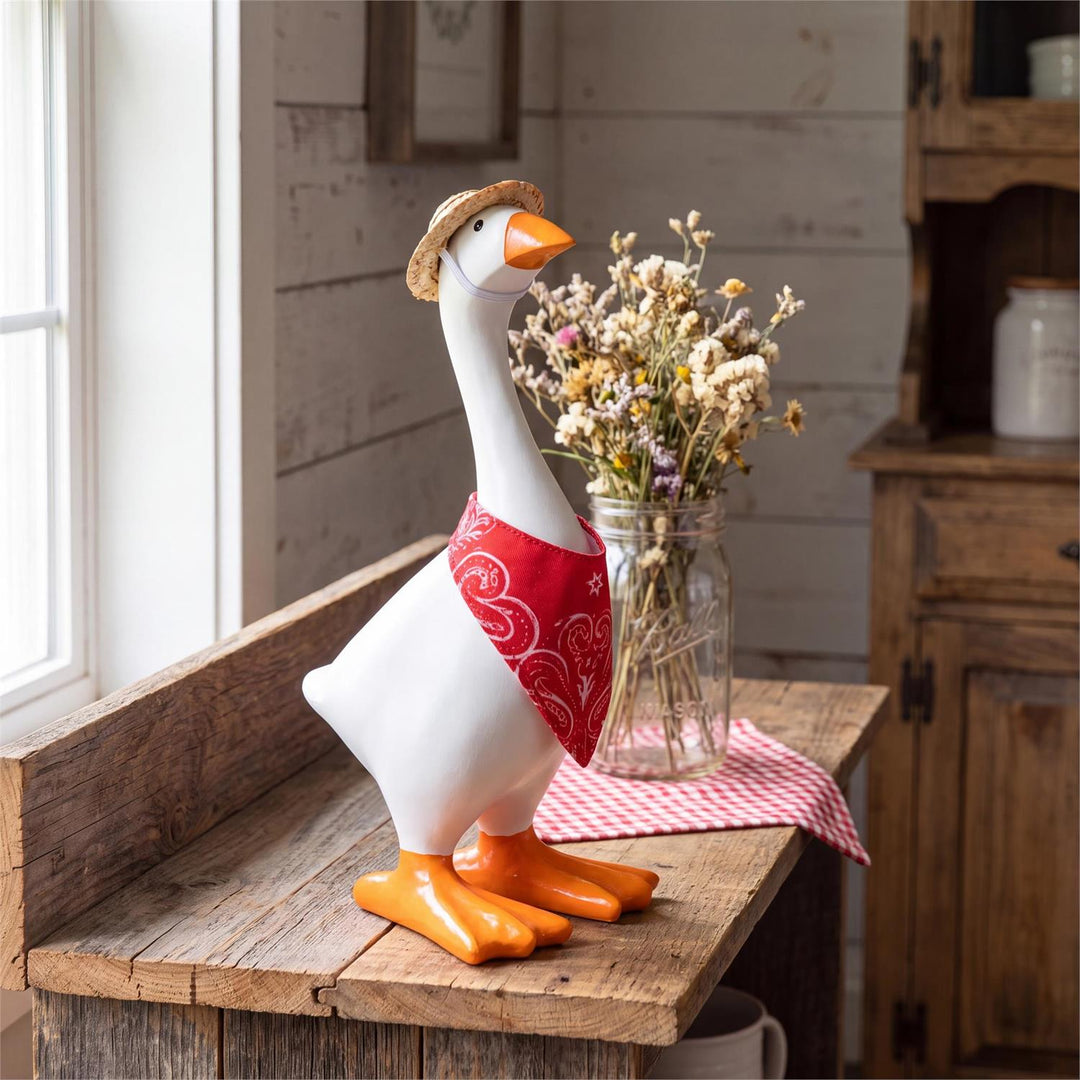 Side view of western outfit on an 8-inch table goose showing hat and red bandana; goose not included