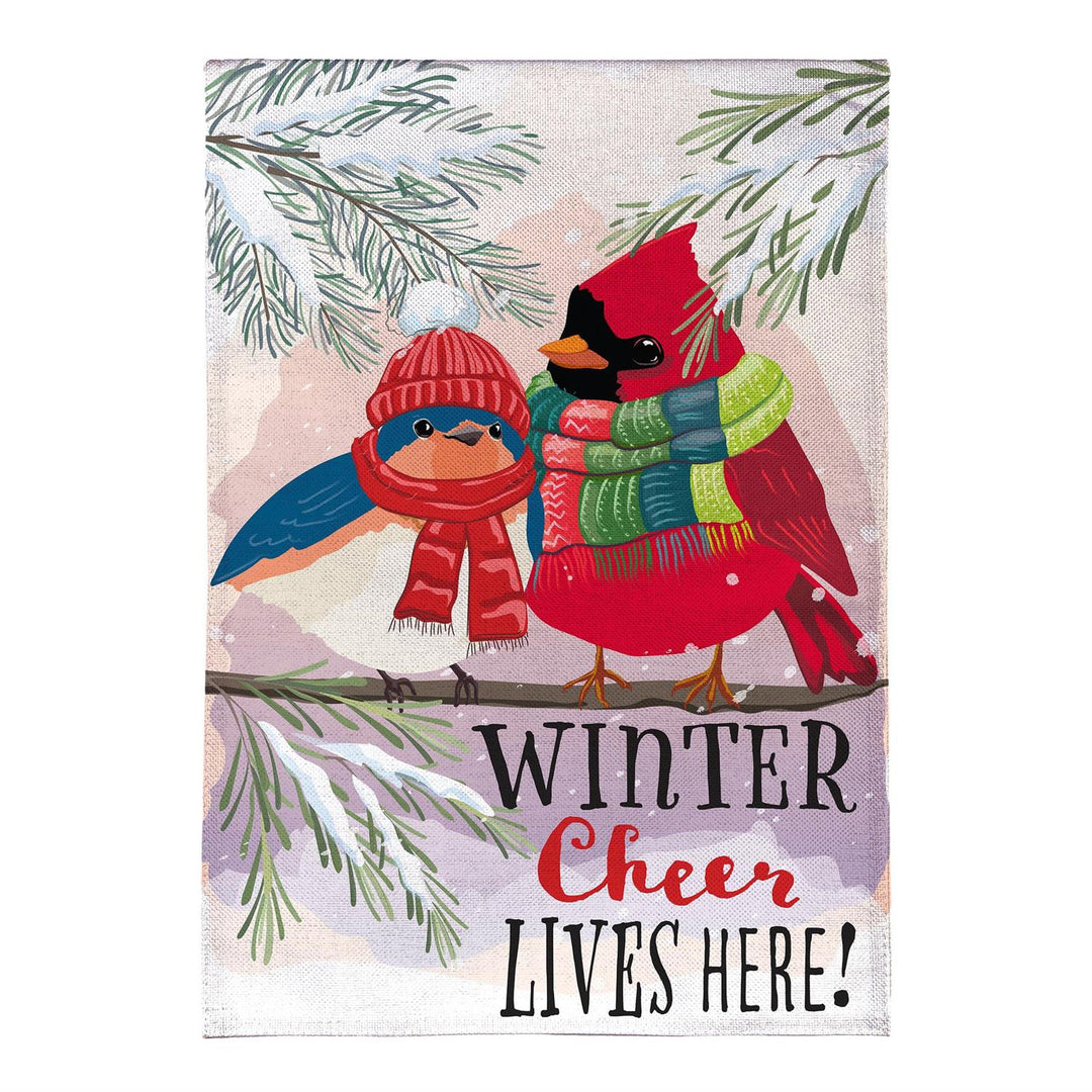 Winter Cheer Portly Birds garden flag displayed on a porch beside a sled
