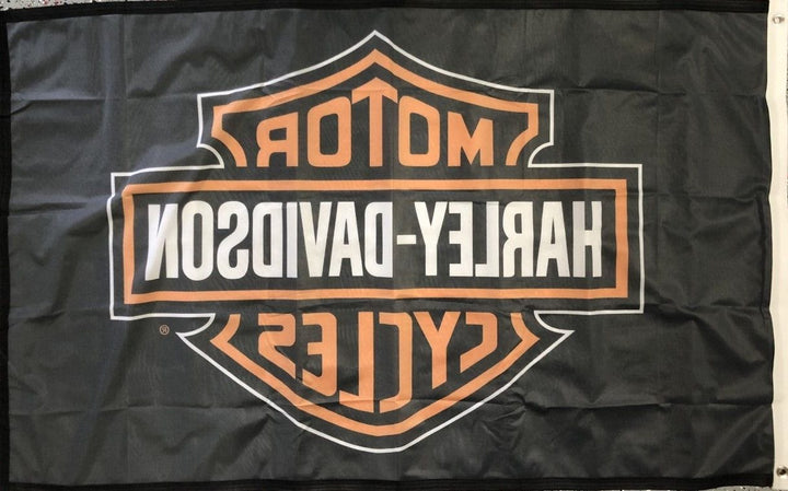 Harley Davidson flag with a distinctive orange and black logo